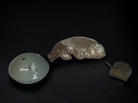 A CHINESE POTTERY 'FISH' SCROLL WEIGHT. Song / Tang dynasty? Together with two water droppers,