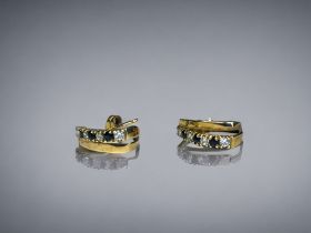 A pair of 9ct gold half hoop earrings. Stamped 375 CZ. Approx. 1g