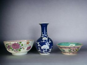 A GROUP OF CHINESE PORCELAIN. Including a painted 'Famille Rose' fruit bowl, Prunus decorated vase