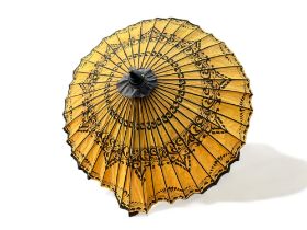 A very large Chinese garden Parasol. 20th century. Hand painted on wax paper.