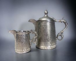 A VICTORIAN SILVER PLATE KASHMIRI STYLE TEAPOT & MILK JUG. By Roberts & Belk, Circa 1875. Elborately