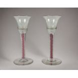 Two Ruby & white Air twist wine glasses. Hand blown Height -15.5cm
