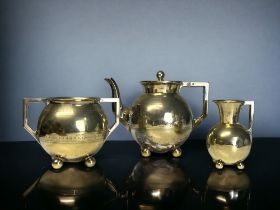 A SIR CHRISTOPHER DRESSER TEASET. By Dixon & sons, circa 1882. Model no. 2266 Gilded, with silver