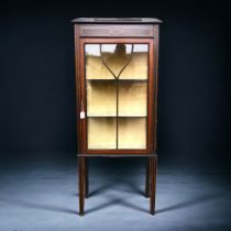 An Edwardian Glazed Display Cabinet. Stood on slender legs with key and fitted interior. Height