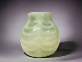 A Victorian Vaseline glass vase. Moulded spherical body, vivid opalescent to yellow colourway. In