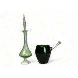 A 1960's glass green horvipint by Sirkku Kumela. Together with a Blenko style green vase & stopper.