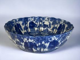 A LARGE JAPANESE IMARI WARE SOMETSUKE PUNCH BOWL. Meiji period. Decorated with Scholars encircling