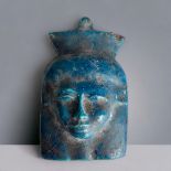 AN EGYPTIAN TURQUOISE GLAZE FAIENCE 'PHAROAH' BUST / AMULET. Possibly Ptolemaic Kingdom.