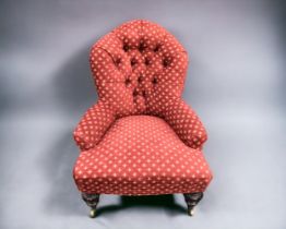 A Victorian button back Nursing Chair. Turned front legs - Later Upholstered. Height 86cm Width 65cm