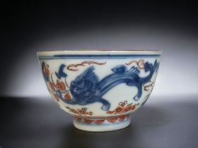 A CHINESE PORCELAIN 'AMSTERDAM BONT' BOWL. Kangxi period. Blue painted Qilong Dragons, with later