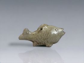 A CHINESE QINGBAI WARE WATER DROPPER. Song dynasty. Modelled as a carp. 9 x 4cm