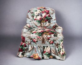 A VICTORIAN 'BOTANICAL' FABRIC ARMCHAIR. On bent and turned wood feet, with original casters. Height