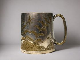 A 19th century small tankard. L. Stewart & Co, Calcutta, India. Engraved design. Height - 6.5cm