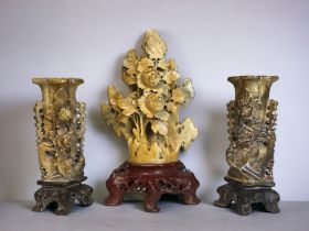 A GROUP OF CHINESE CARVED SOAPSTONE VASES. Qing dynasty. Comprising a pair of floral carved vases