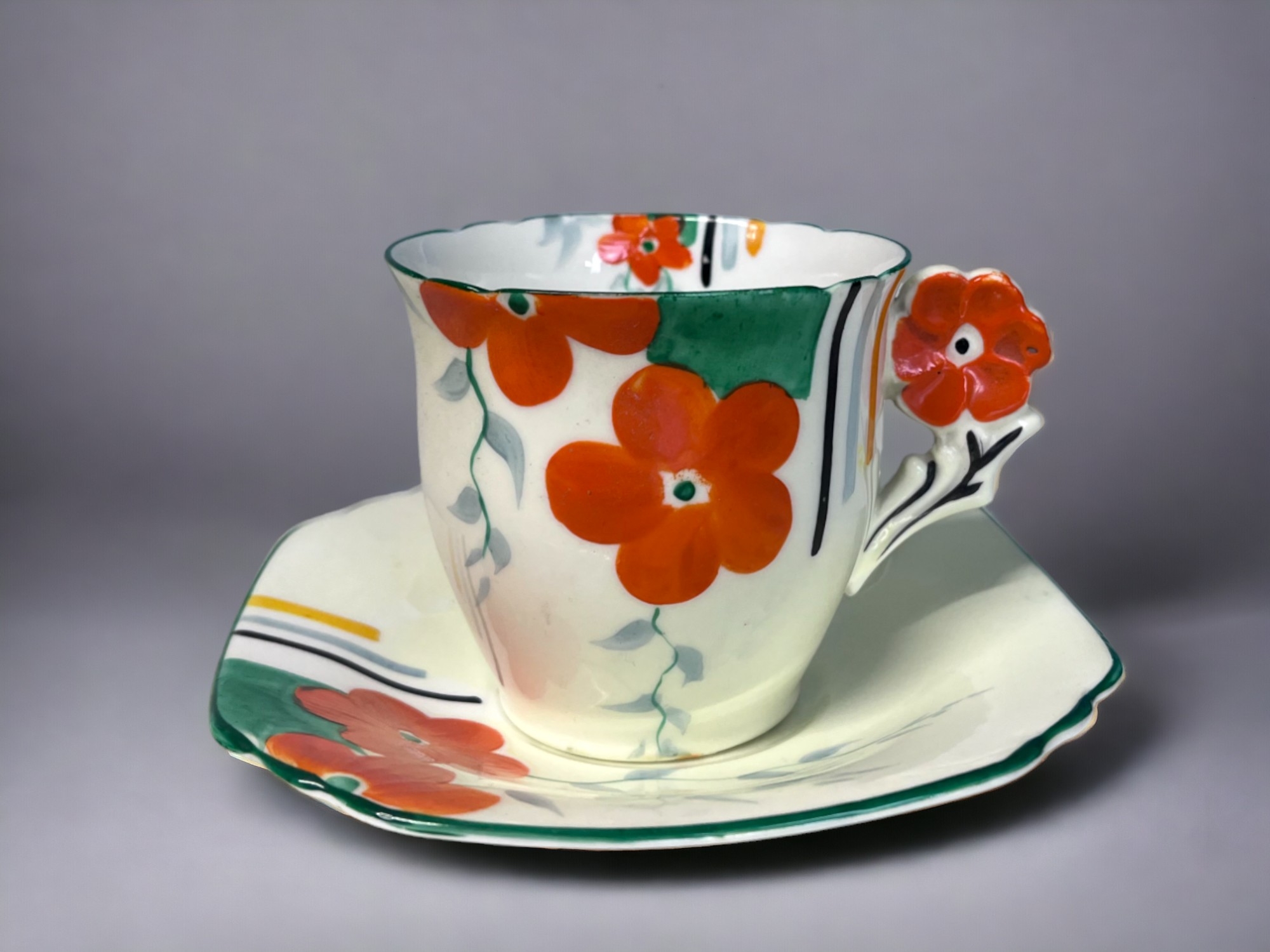 AN ART DECO HAND PAINTED PART TEASET. Hand painted floral pattern with 'flower' handles. Includes, - Image 3 of 4