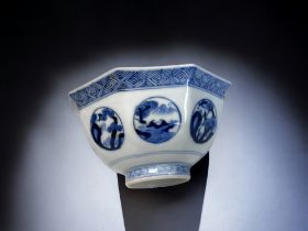 A JAPANESE BLUE & WHITE PORCELAIN BOWL. Edo / Meiji period. Octagonal form, painted with circular