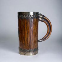 A CHRISTOPHER DRESSER FOR HUKIN & HEATH TANKARD. Textured wood & pierced metal design with tusk