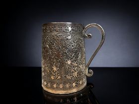 A 19TH CENTURY SILVER PLATE TANKARD. Elkington & co. Decorated in a Persian 'Paisley' style design.