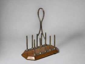 A 19TH CENTURY SILVERPLATE & OAK TOAST RACK. By Daniel & Ater, Birmingham. Height - 19cm