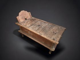 A 19TH CENTURY TEAK JAVANESE DAY-BED (GROBOG). HAND CRAFTED IN INDONESIA, LATE 19TH CENTURY.