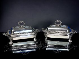 AN IMPRESSIVE PAIR OF GEORGIAN SHEFFIELD PLATE ENTREE DISHES. On warmer stands. Elaborate stylised