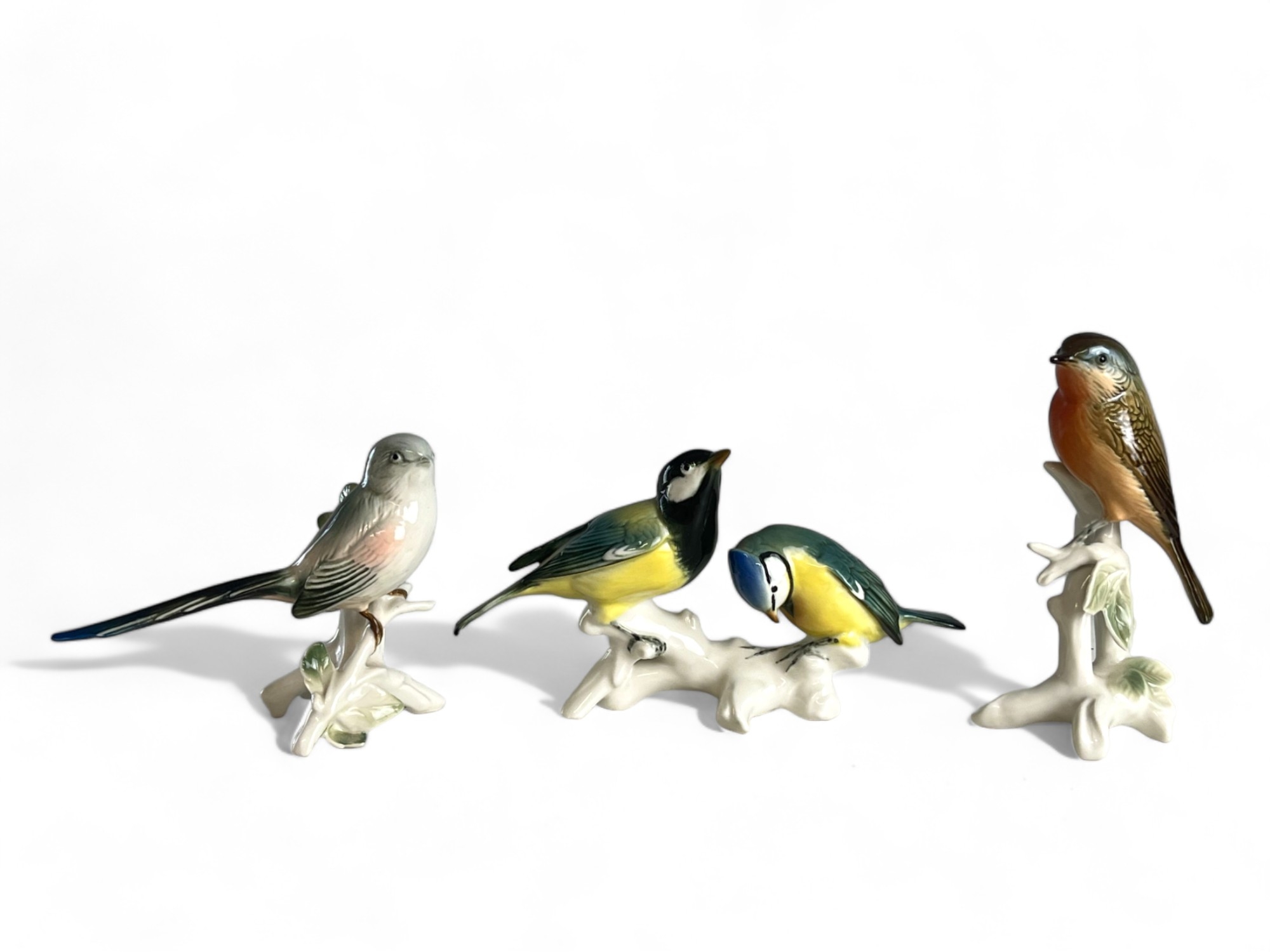 Three Karl Ens porcelain bird figures. 