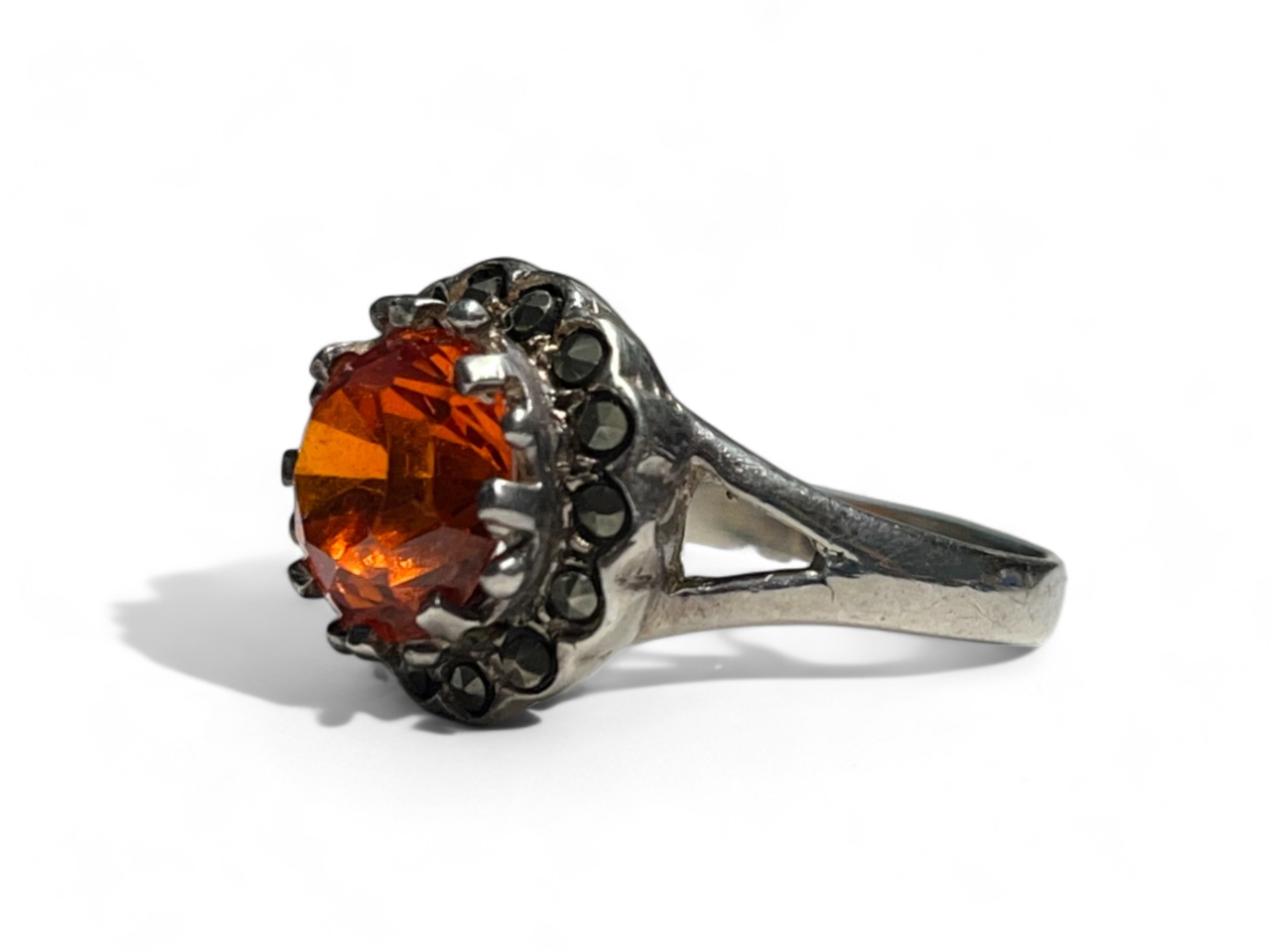 A silver, Marcasite and orange stone set ladies ring. Stamped S925.  - Image 3 of 3