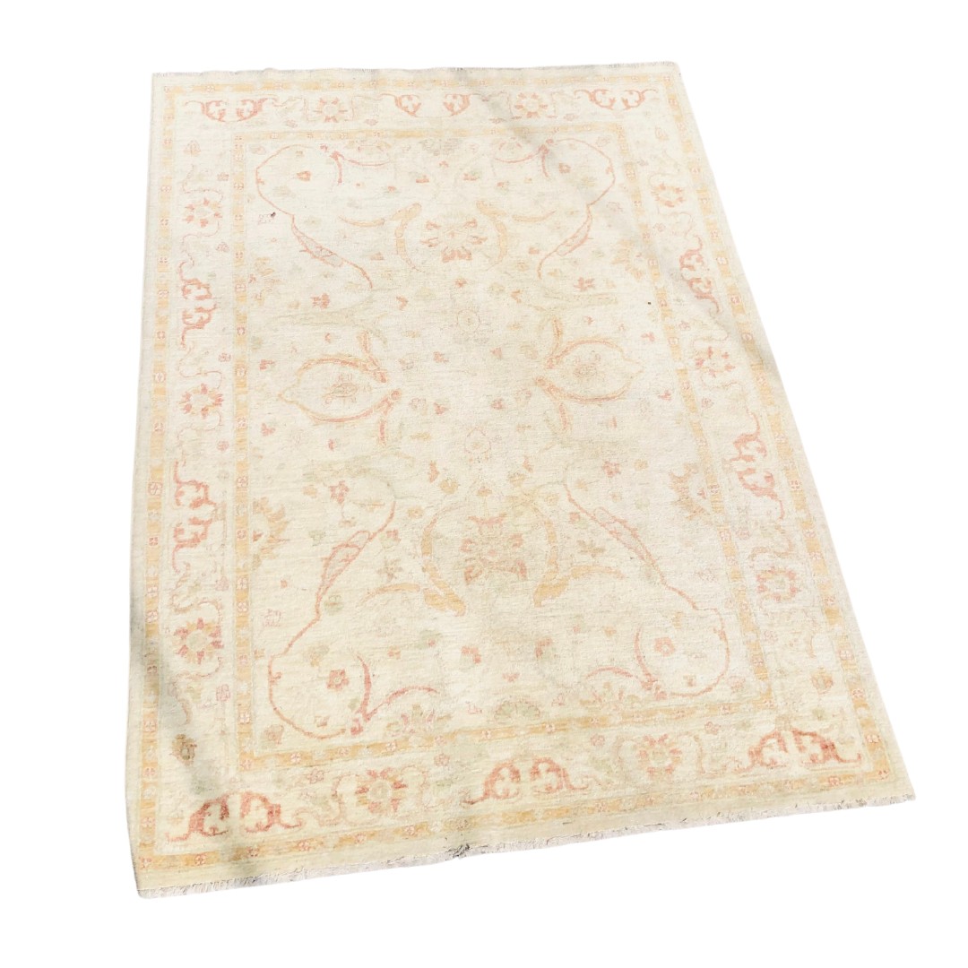 Large 20th Century Pakistani Cream Ground Wool Rug. 245cm x 180cm 