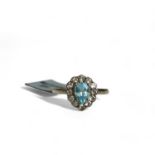 A sterling silver & blue stone ladies ring. 