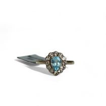 A sterling silver & blue stone ladies ring.