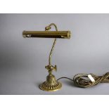 A vintage brass bankers desk lamp.  Original wiring, so will need re-doing. 