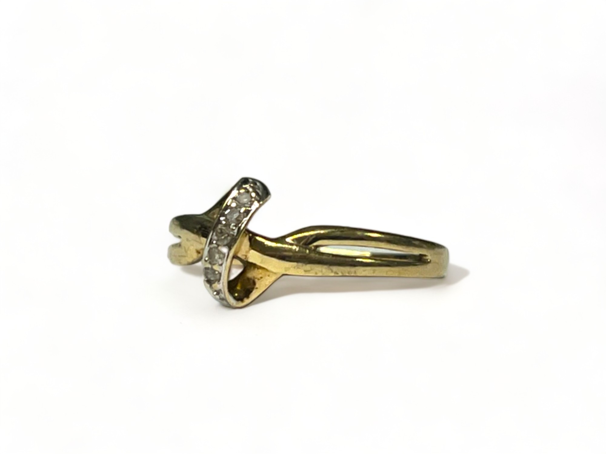 A 9ct gold & diamond cross over ring. Size - k 1/2. Approx. 1.3g  - Image 2 of 2