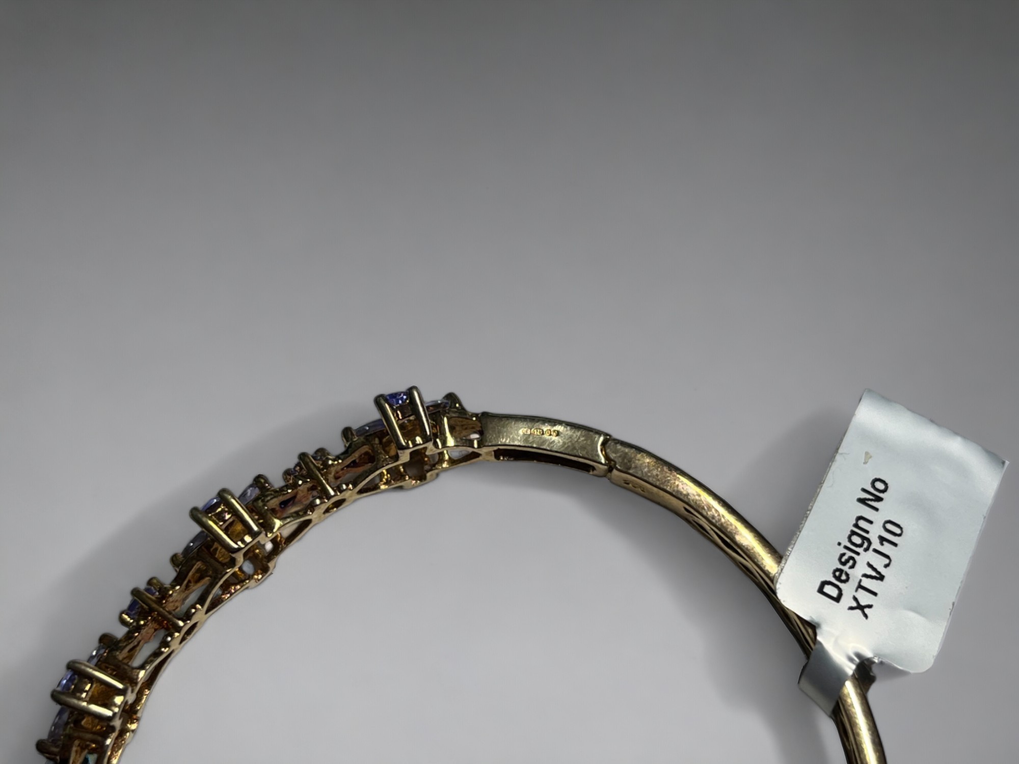 A Tanzanite & 18ct gold plate in silver ladies bracelet. Set with total 2.81cts round & pear cut Tan - Image 3 of 4