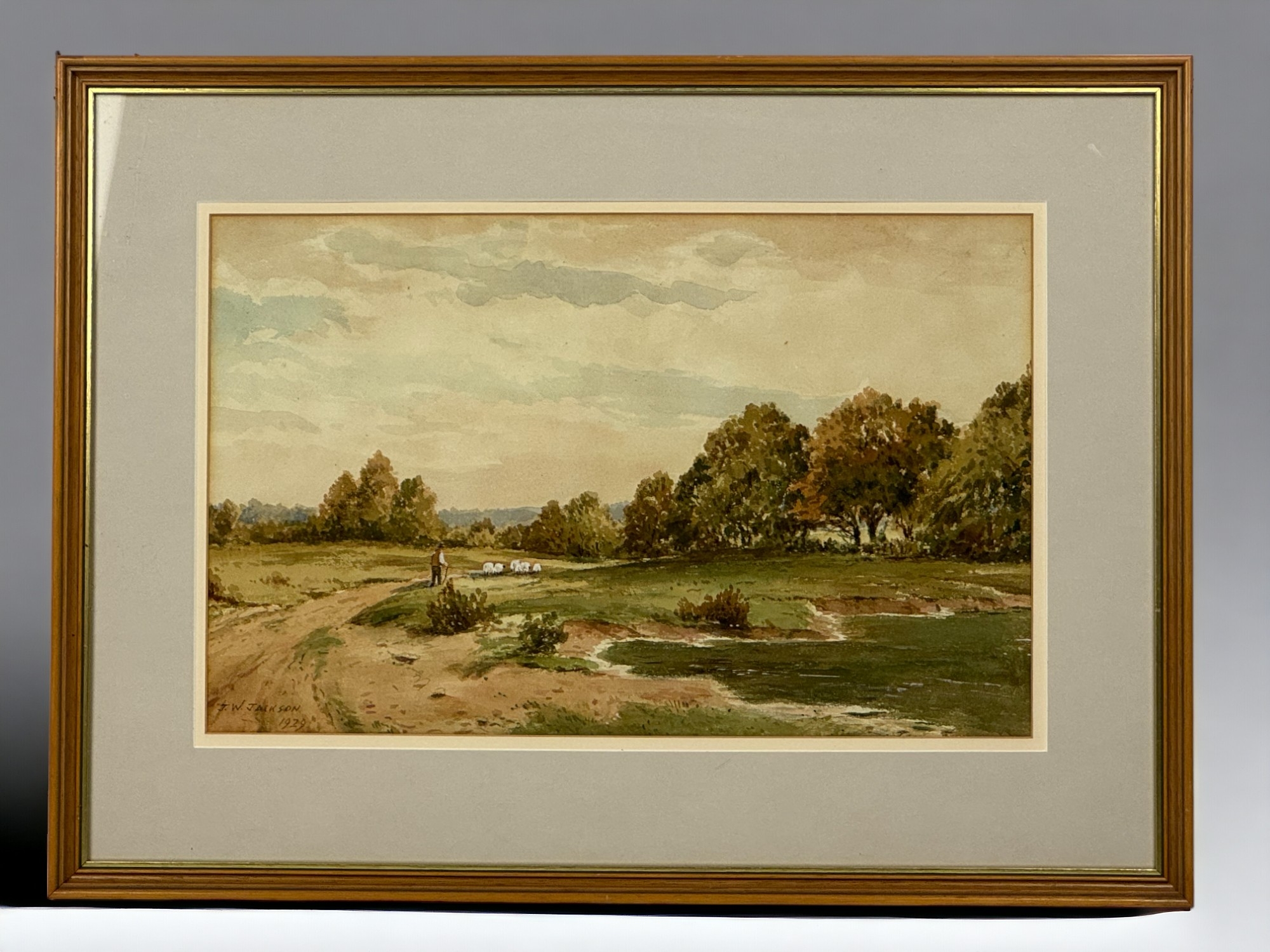 A Signed J.W. Jackson Watercolour.
Depicting "Esher common".
Signed & dated 1929. 