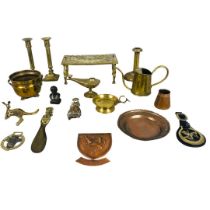 Collection of brass and copper items to include horse brasses, candlesticks and watering can