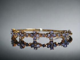 A Tanzanite & 18ct gold plate in silver ladies bracelet. Set with total 2.81cts round & pear cut Tan