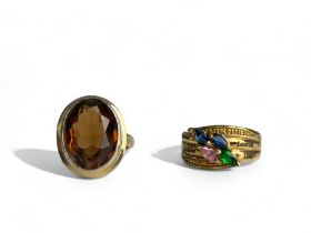 Two sterling silver gilt ladies rings. Set with coloured gemstones.