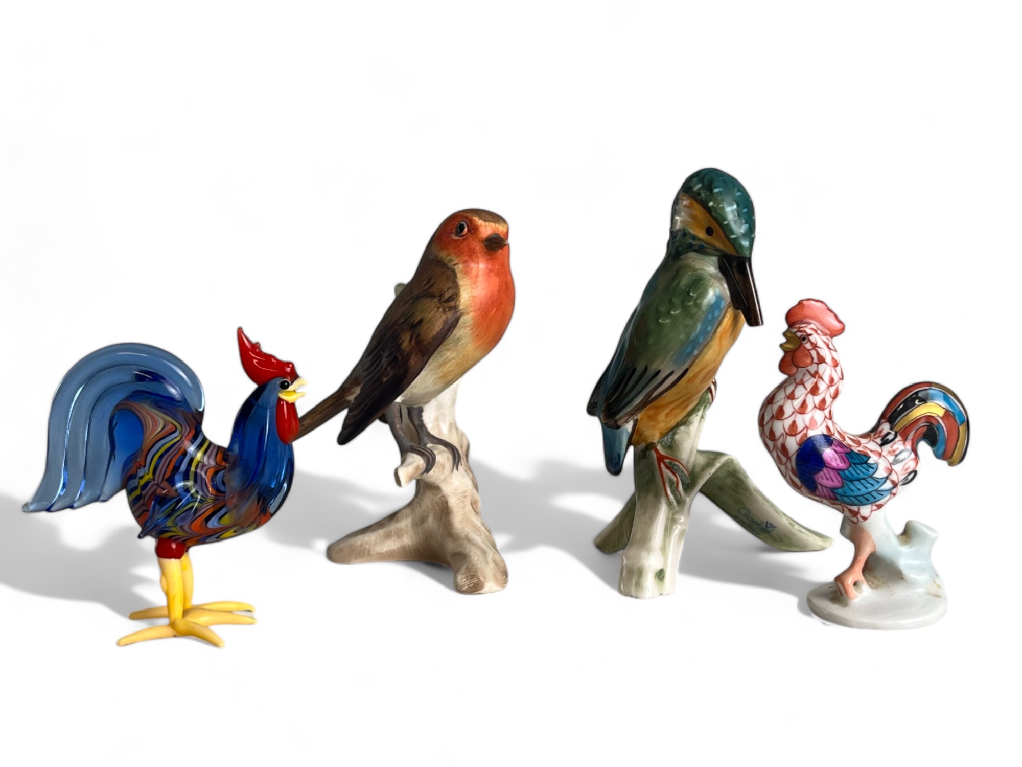 A collection of four porcelain & glass birds. Including Karl Ens, Goebels birds. Herend & Murano gla