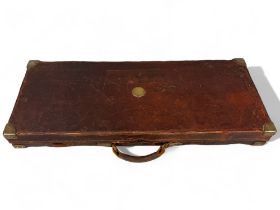Antique William Evans leather & brass bound gun case. With fitted interior and original label.  85 x