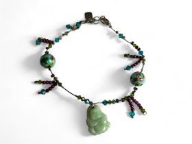 A Chinese Charm anklet. Mounted with Jade Buddha, flower painted balls and glass beads.