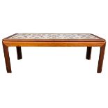Mid 20th Century G Plan Tile topped table of mahogany construction. Label to underside.  Height 39.5