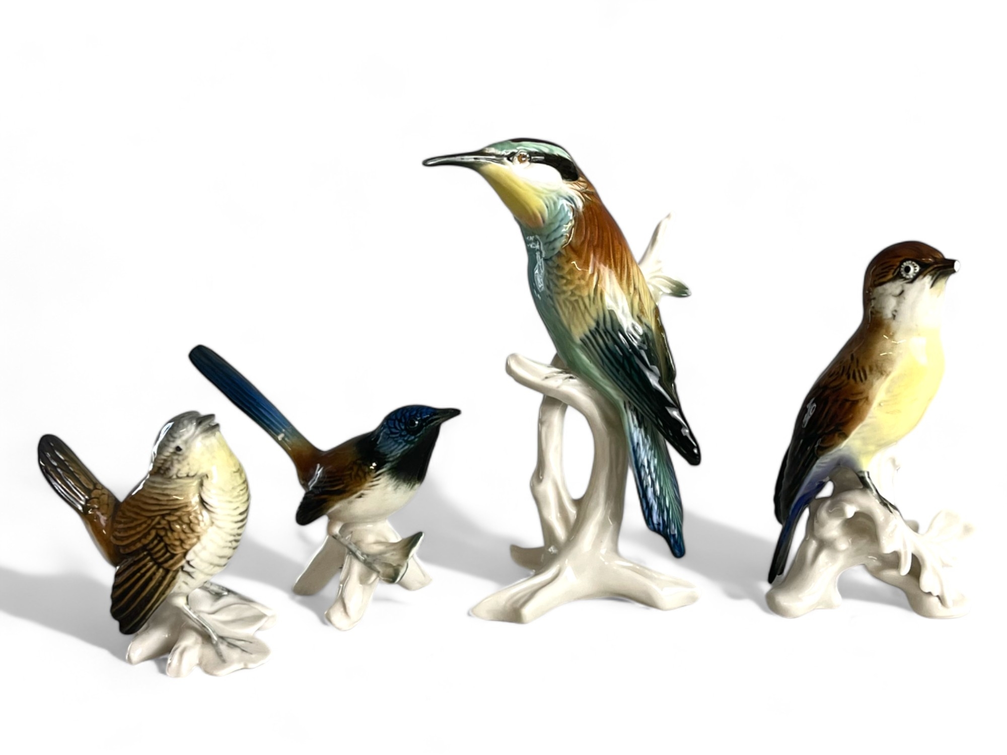 A collection of four Karl Ens porcelain bird figures. 