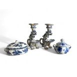 A pair of Continental Delft 'Gothic' Dragon candlesticks, together with a pair of German blue & whit