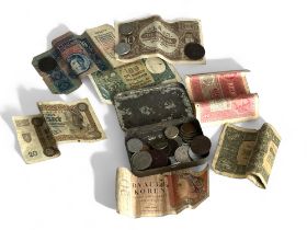 A collection of Eastern European bank notes, together with a tin of mainly European coins, 19th & 20