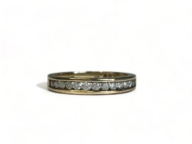 A 9ct Gold and Diamonds half eternity ring. Fully hallmarked. Size - K 1/2 Approx. 2.2g