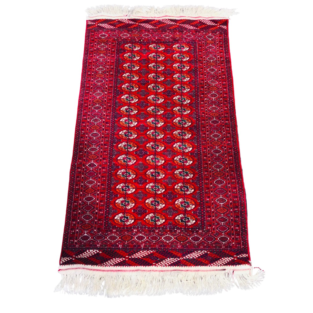 Large Turkman Tekke Red Ground Rug. 220cm x 125cm 