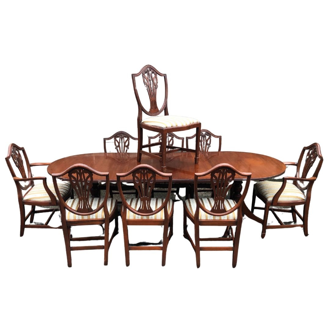 Dining Room Table and 8 drop-in-seat upholstered dining chairs.