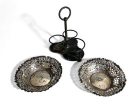 A pair of Sterling silver pierced Bon Bon dishes. Together with a sterling silver condiment base. B