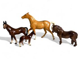 A Collection of Four Bone China Horse Figures.