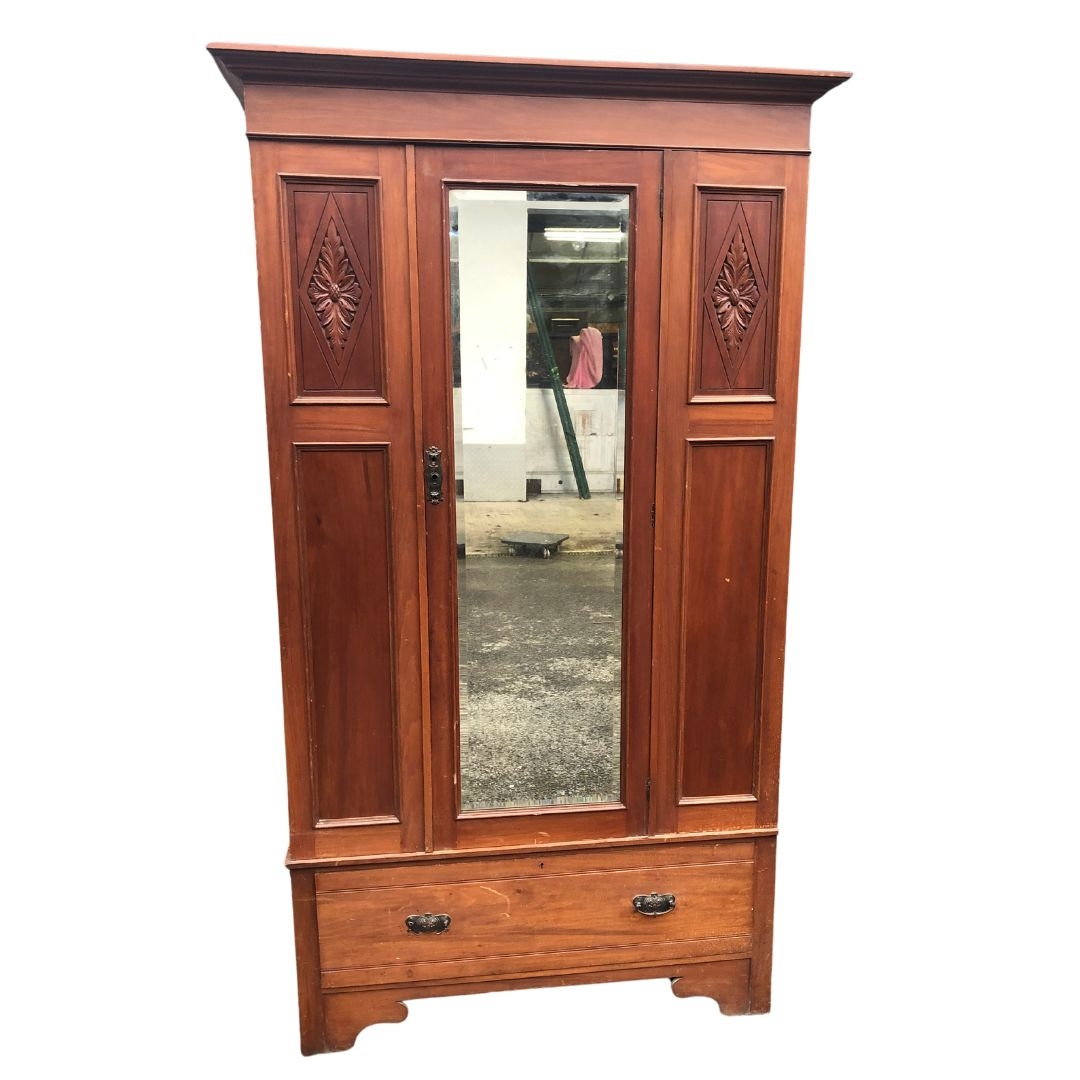 Wardrobe with central bevelled dressing mirror and drawer beneath. Approx 203cms x 117 x 50 